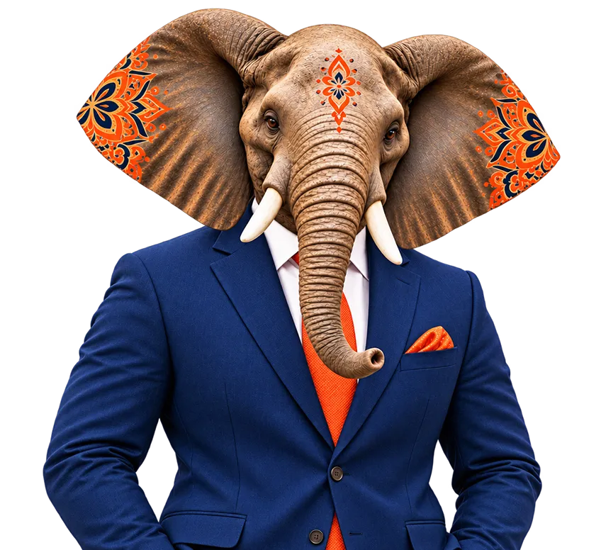 Granth's elephant mascot in a navy suit, its ears patterned in orange tribal motifs, typing on a laptop
